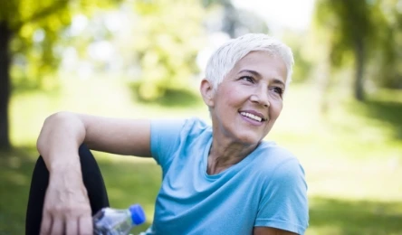 happy middle aged woman, enjoying time outside