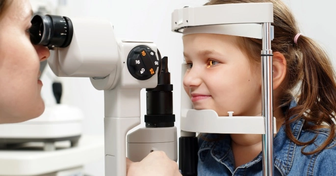 young girl during eye exam