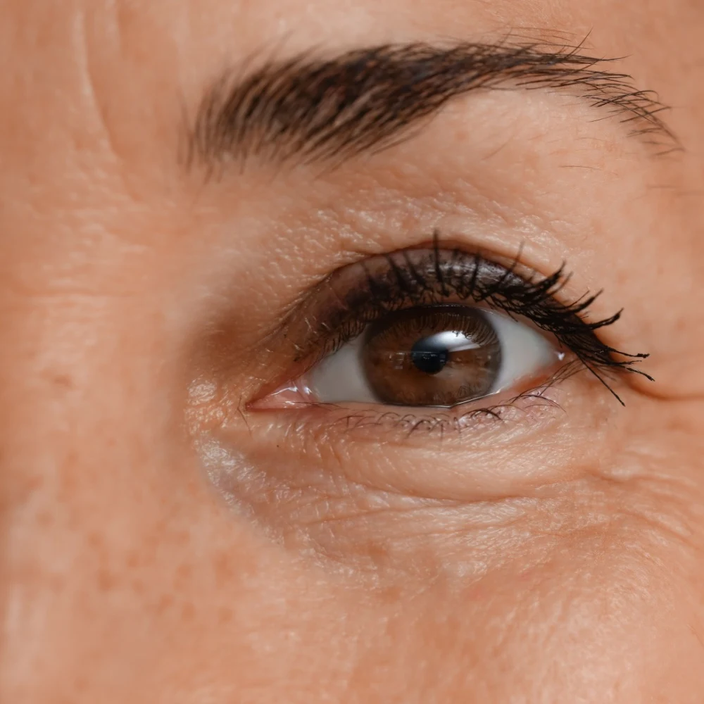 middle aged woman brown eye close up